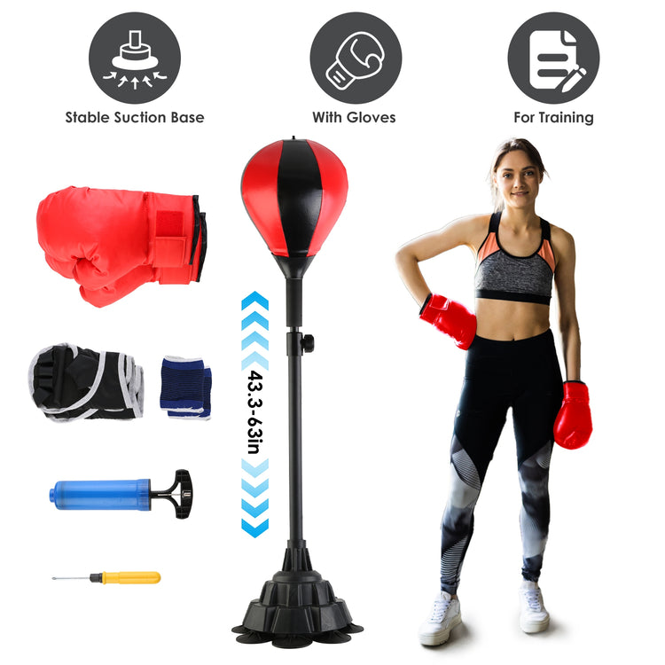 a woman wearing boxing gloves and a punching bag