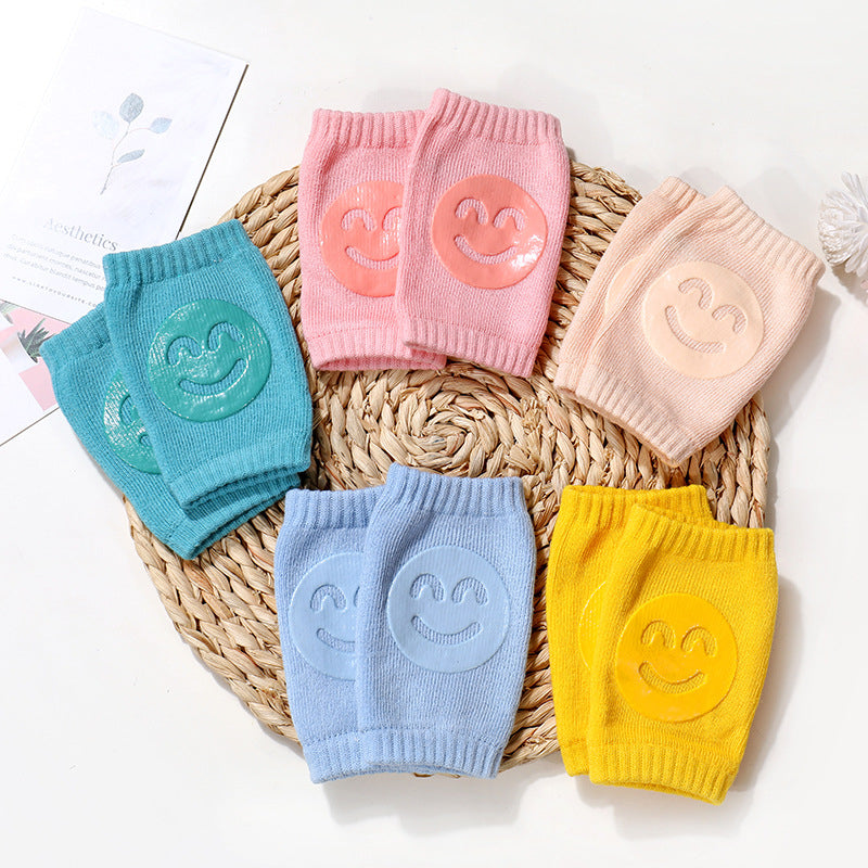 a group of colorful socks with smiley faces on them