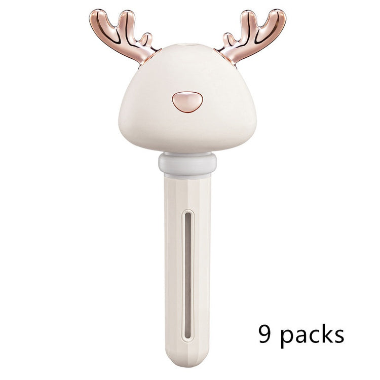 a white and gold reindeer head