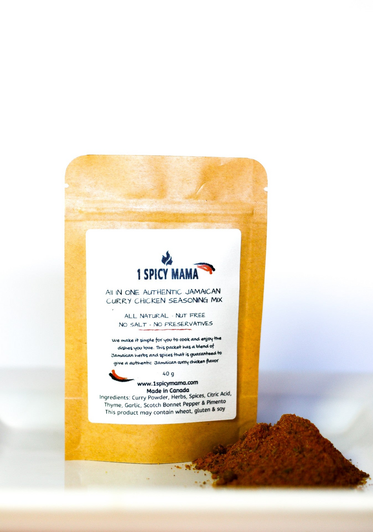 a brown bag with a white label next to a pile of brown spices