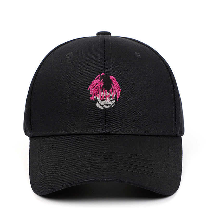 a black hat with pink hair on it