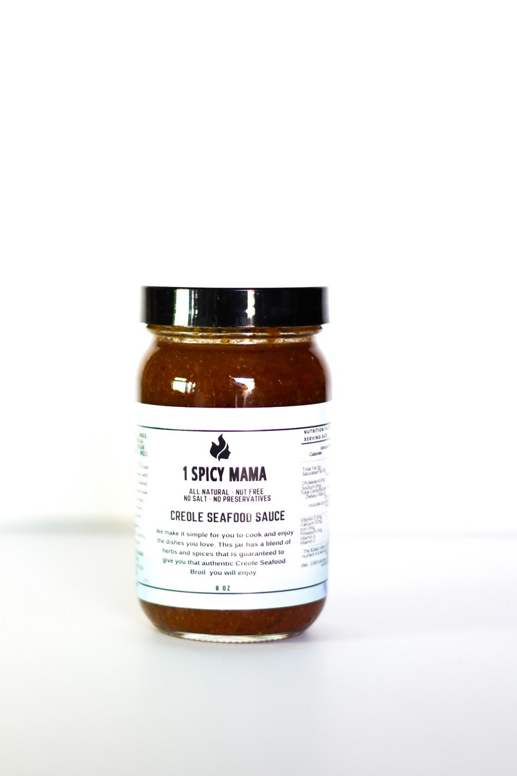 a jar of sauce with a white label