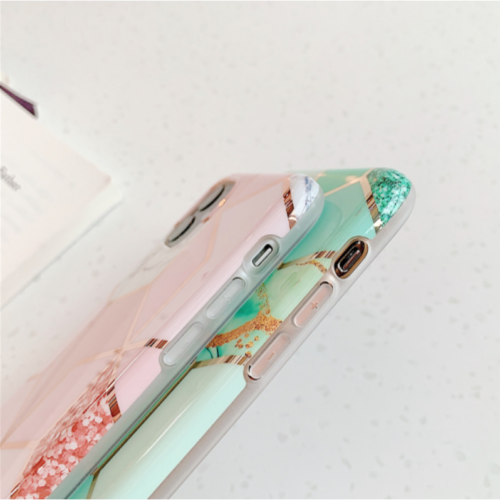 two cell phones on a table