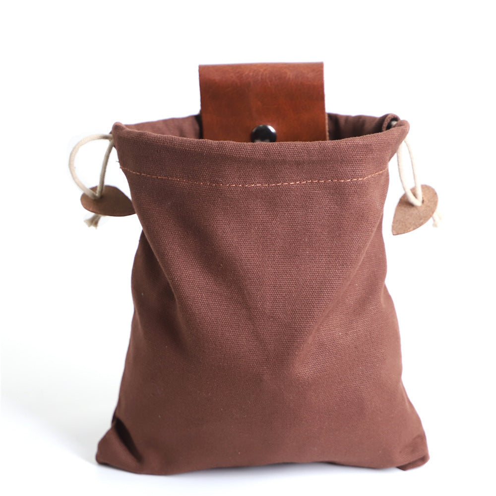 a brown bag with a leather belt inside