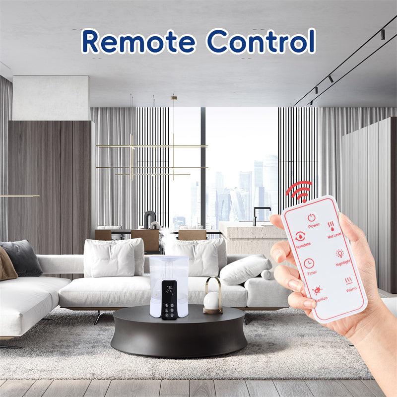 a hand holding a remote control in a living room