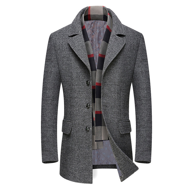 a grey coat with a striped scarf