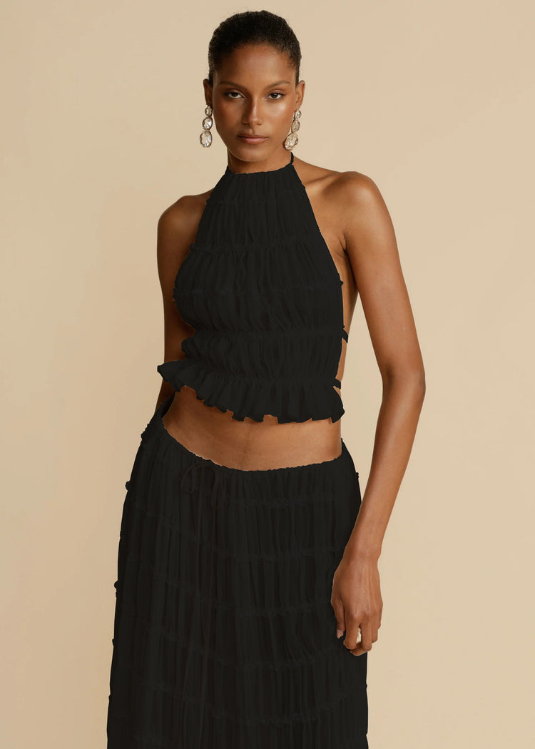 a woman in a black dress