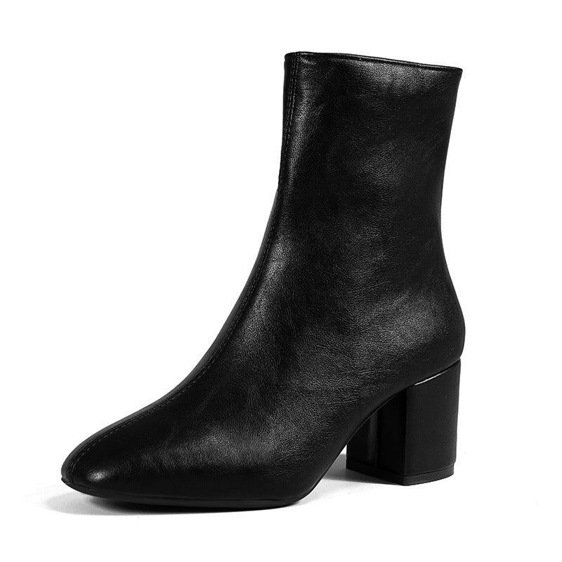 a black boot with a high heel