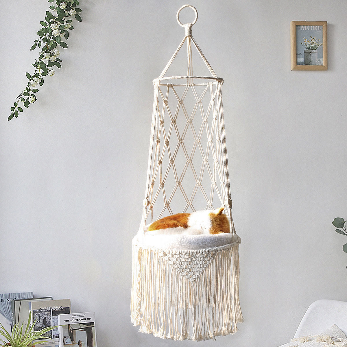 a cat lying in a basket