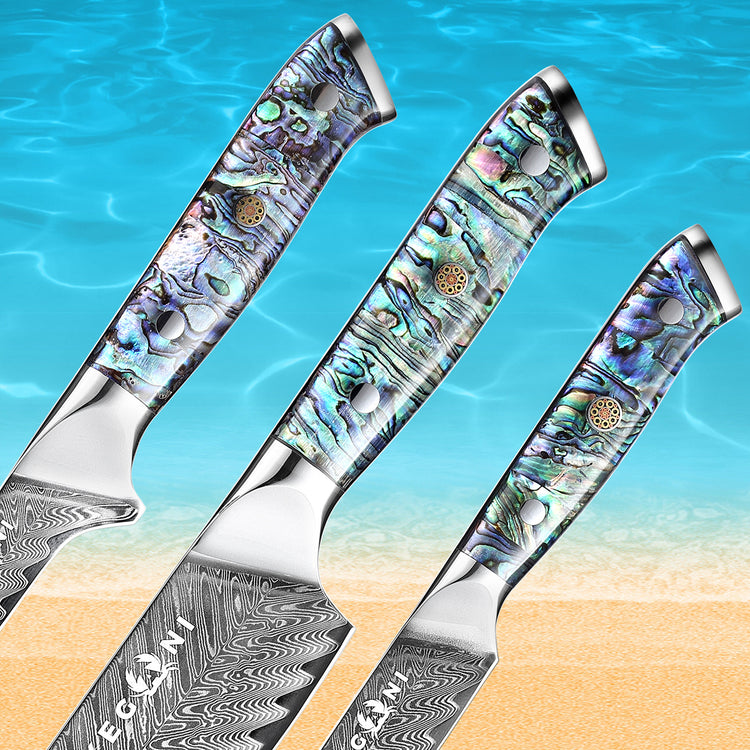 a group of knives on a beach