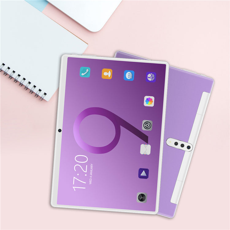 a tablet and notebook on a table