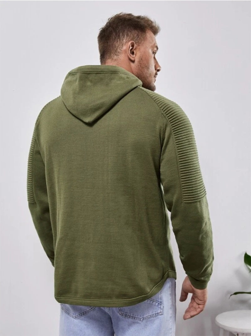 a man in a green jacket