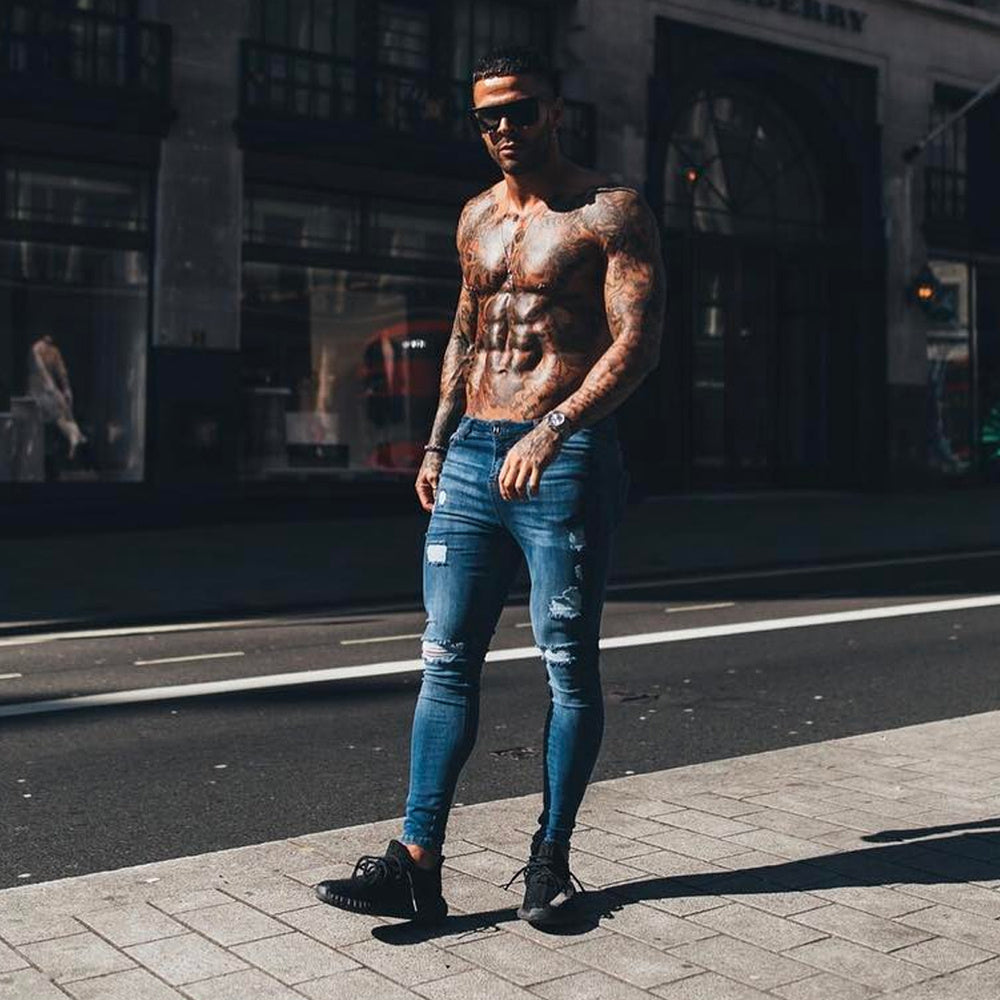 a man standing on the sidewalk