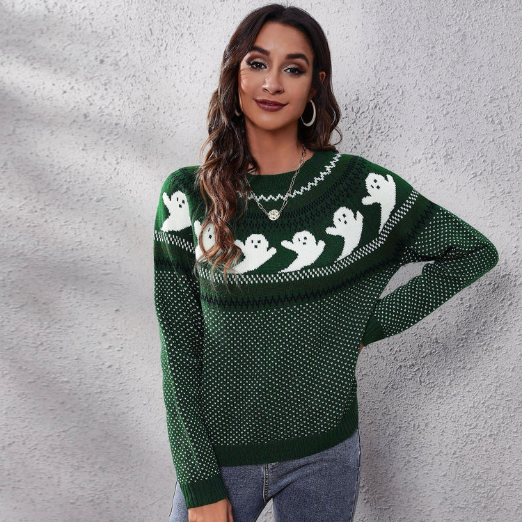 a woman in a green sweater