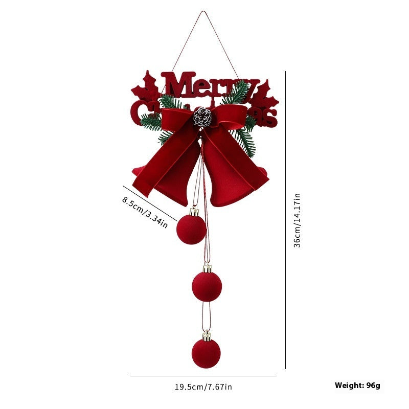a red bell with a bow and balls from a string