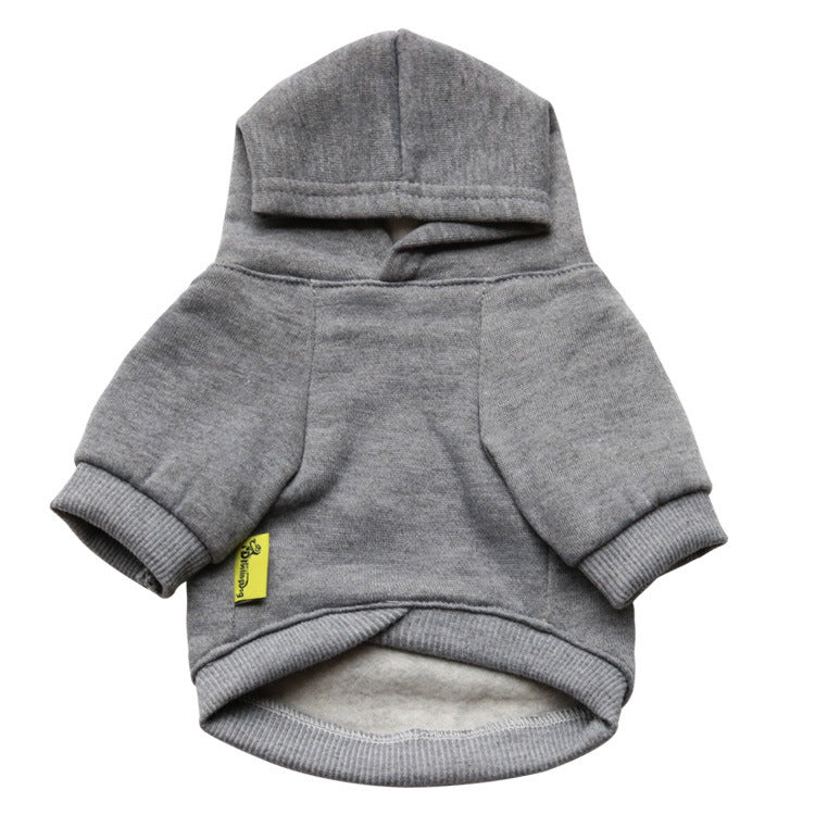 a grey sweater with a yellow label