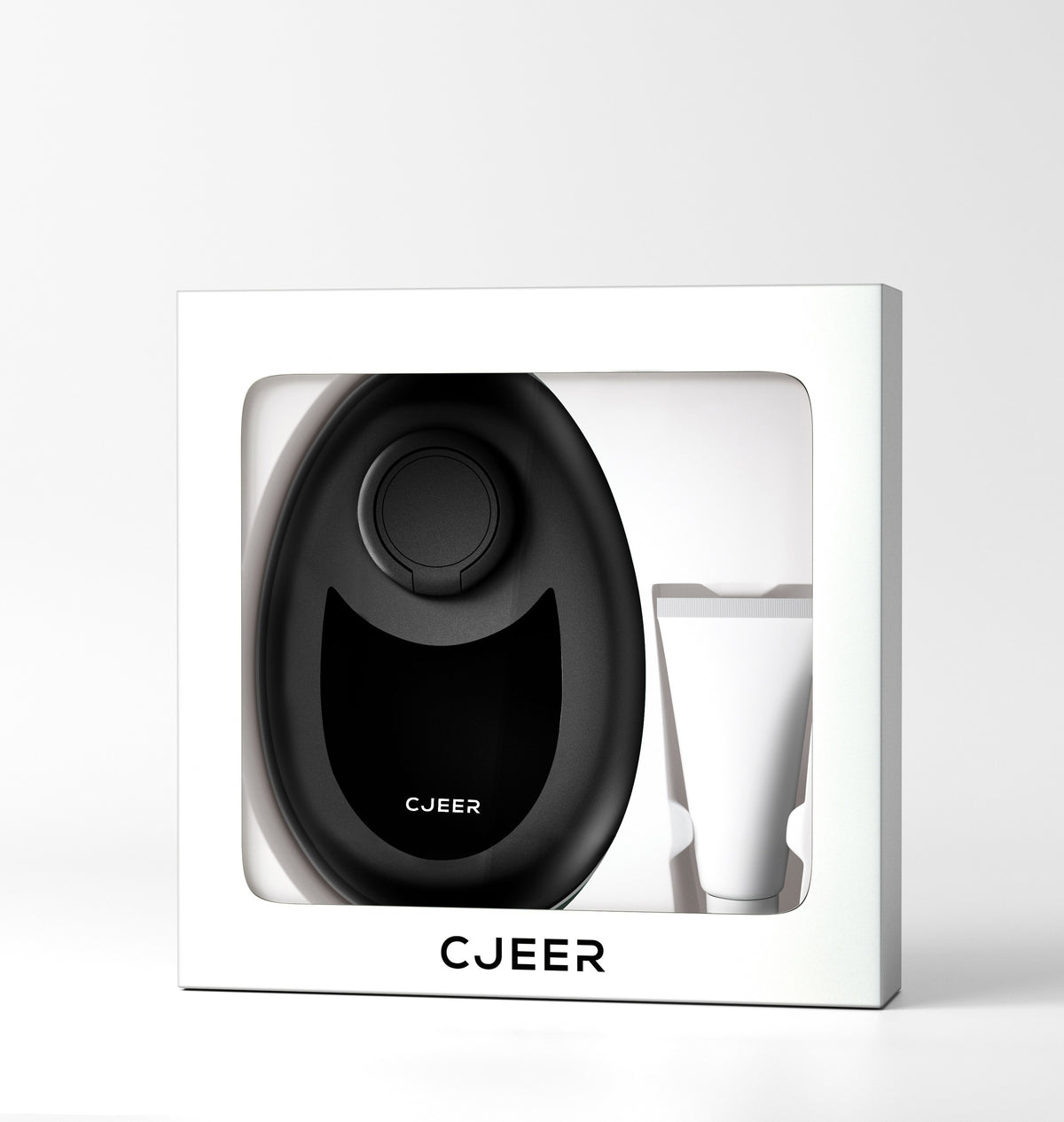 a black oval object in a white box