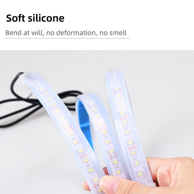 a hand holding a light strip