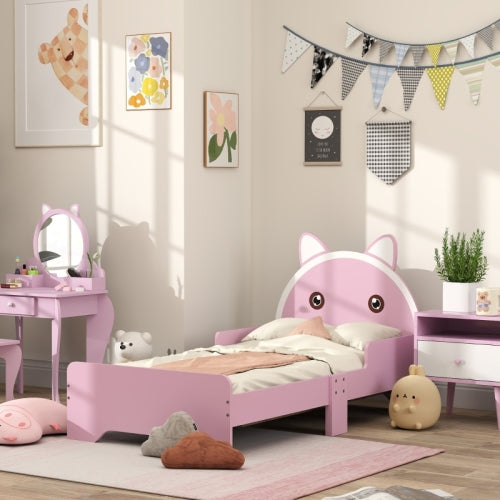 a pink bedroom with a bed and a mirror