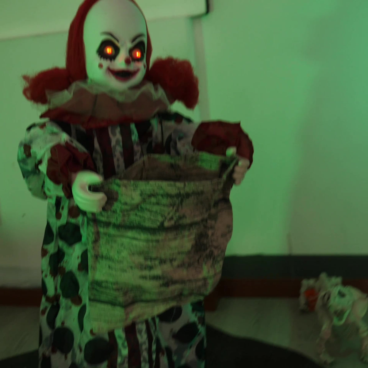 a clown holding a bag