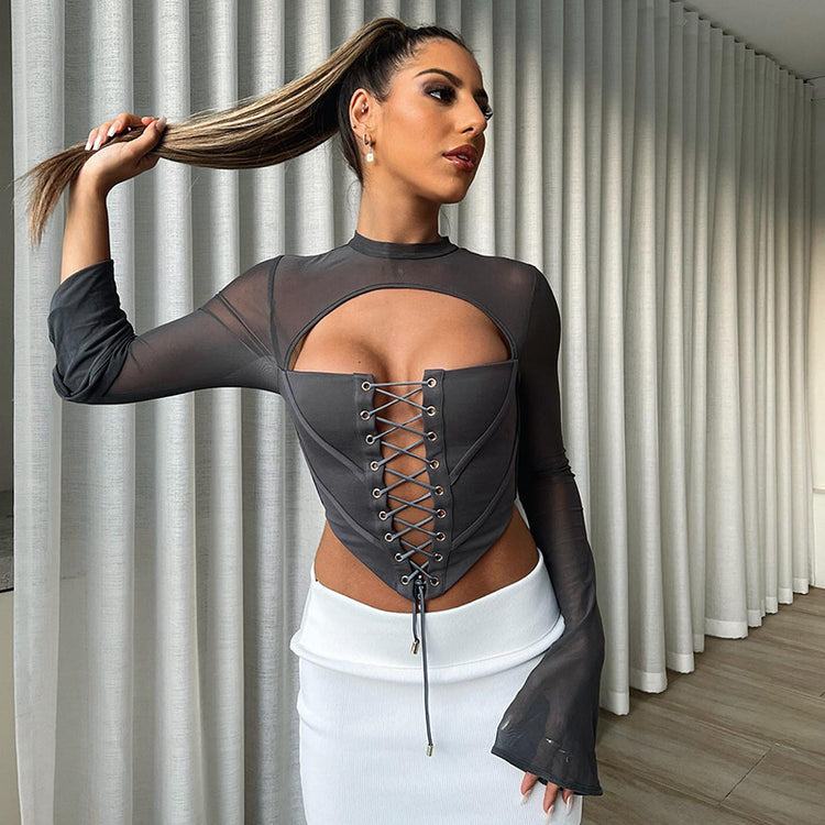 a woman in a white skirt and a black top