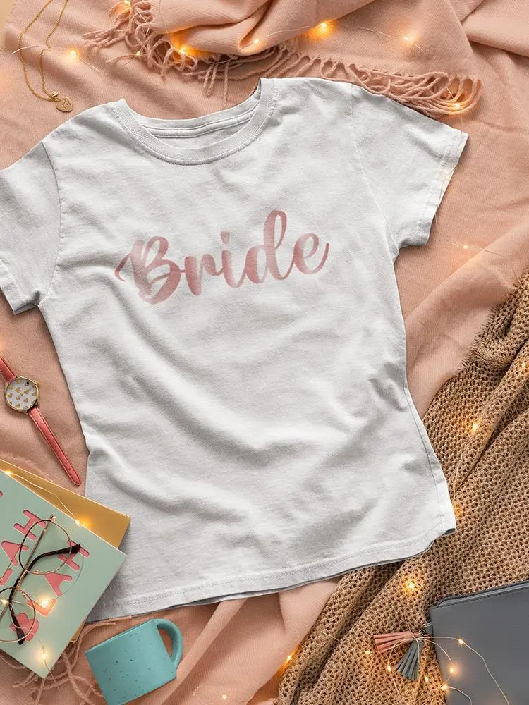 a white shirt with pink lettering on it