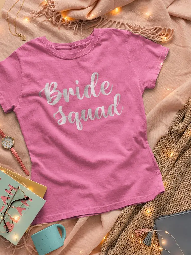 a pink shirt on a blanket