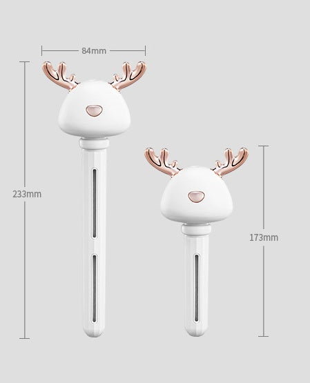 a couple of white objects with a reindeer head