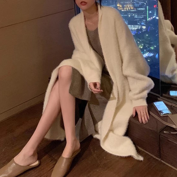 a woman sitting on a ledge