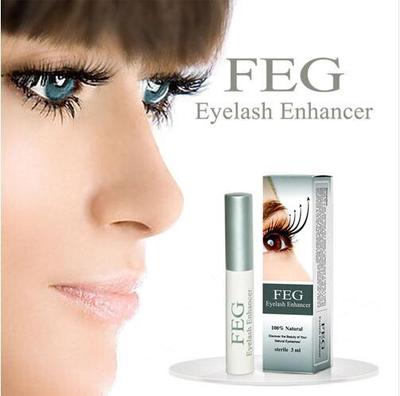 a woman with long eyelashes and a tube of eyelash