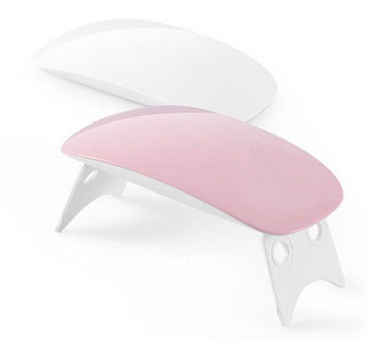 a pink and white nail polish