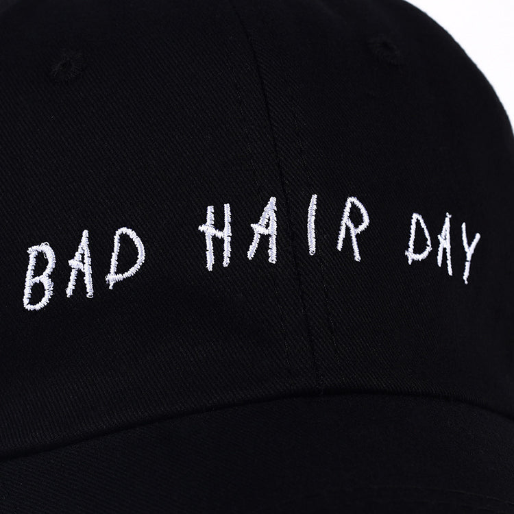 a black hat with white text on it