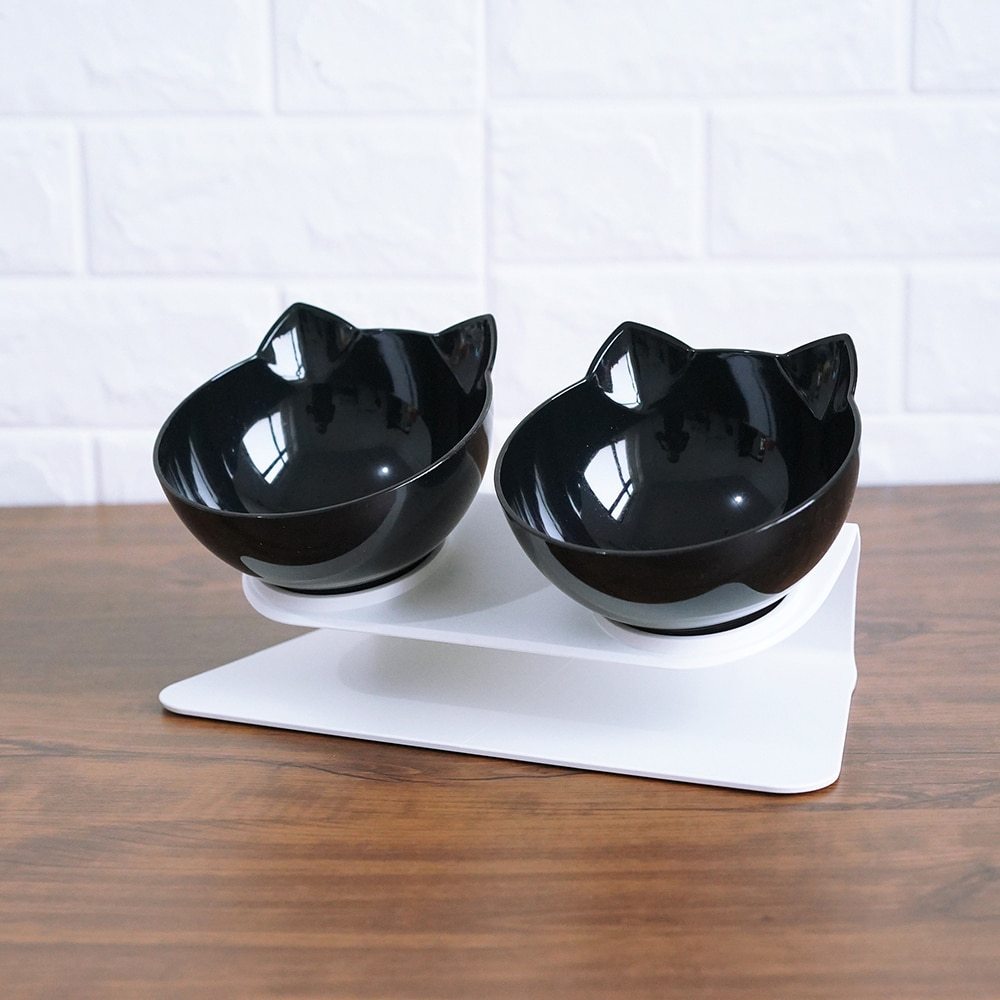 two bowls on a stand