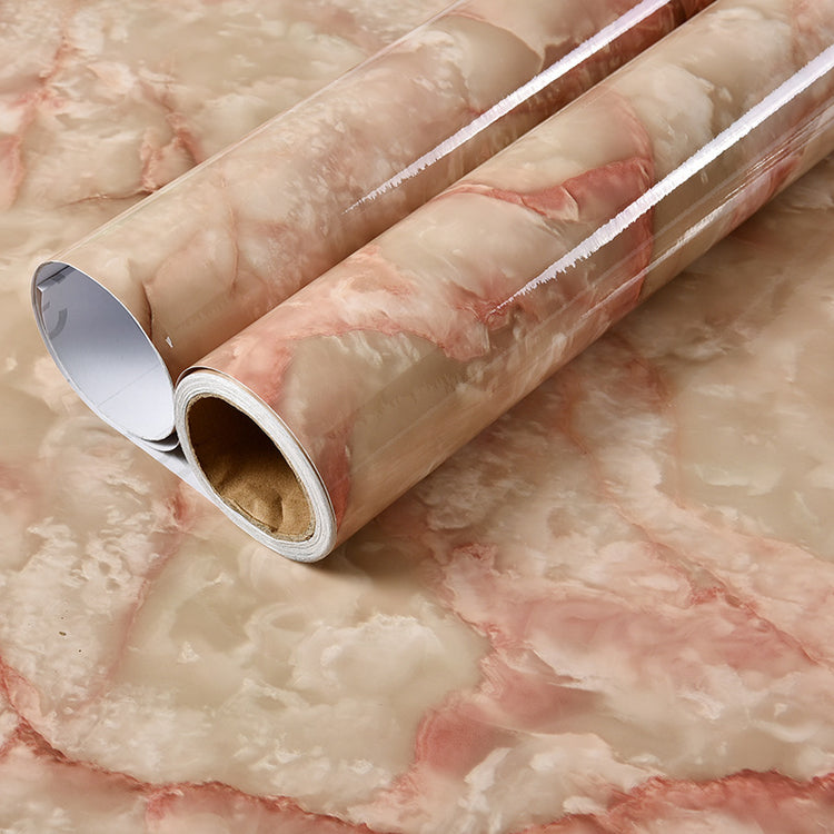 a roll of pink and white vinyl