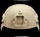 a tan helmet with a black background