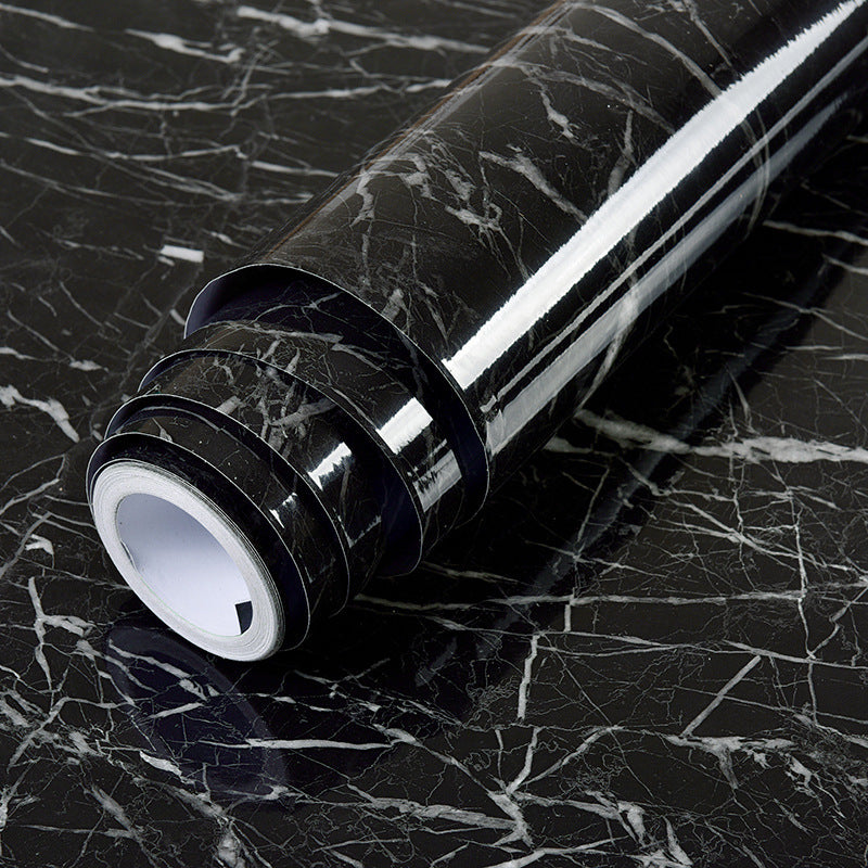 a roll of black and white vinyl
