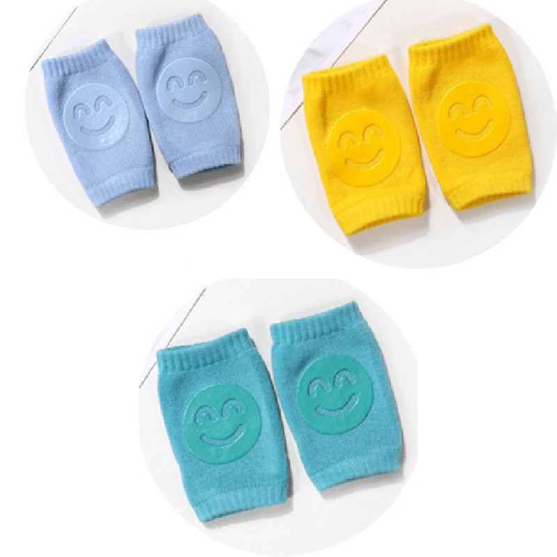a pair of blue and yellow baby socks