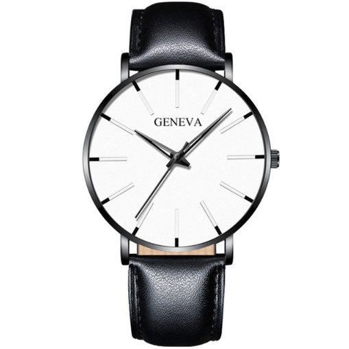 a black and white watch with leather straps