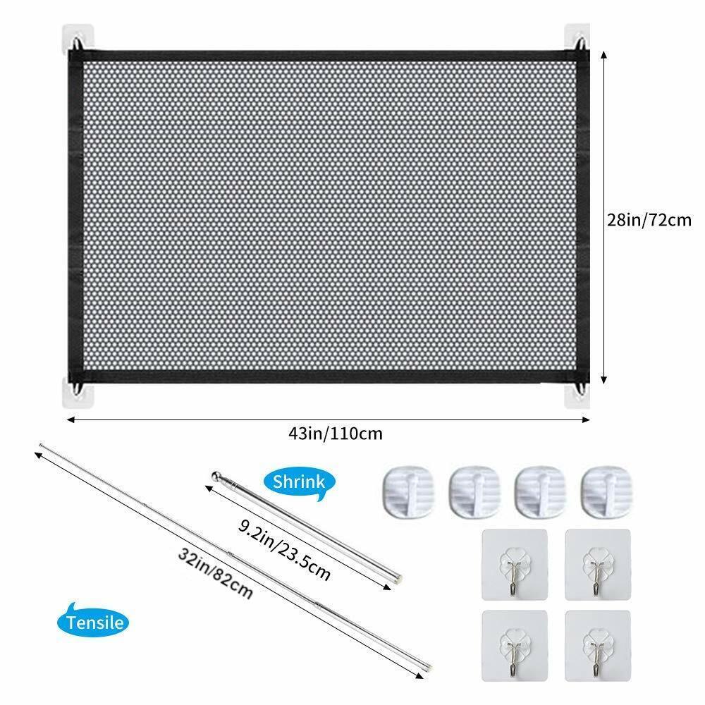 a black mesh fence with hooks and a few white plastic clips
