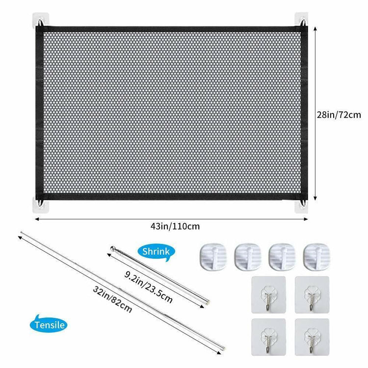 a black mesh fence with hooks and a few white plastic clips
