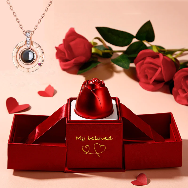 a red box with a necklace and roses