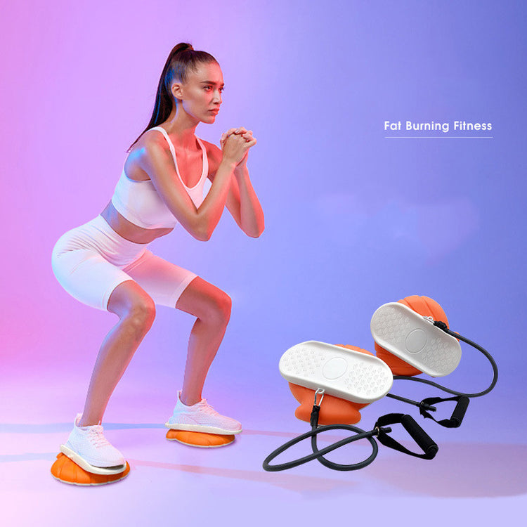 a woman squatting next to an exercise equipment