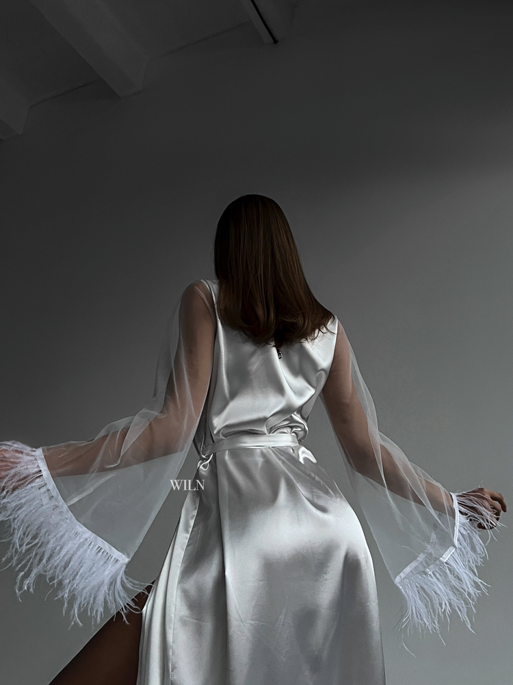 a woman in a white robe