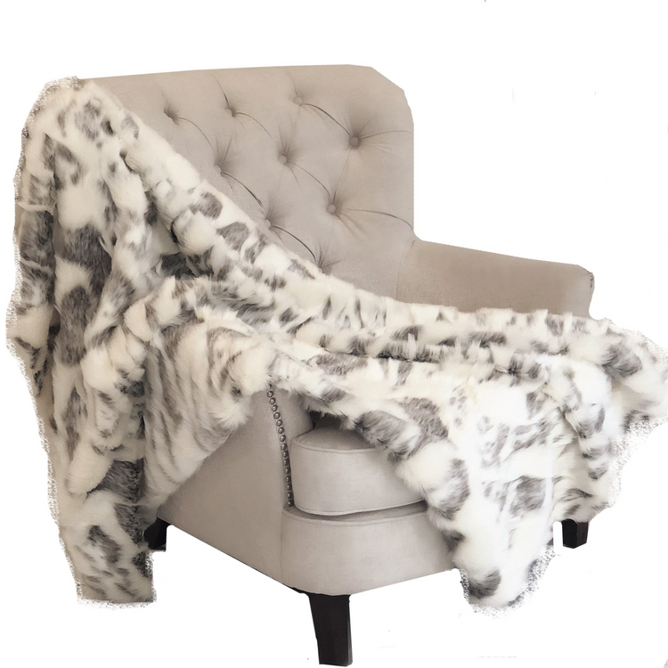 a chair with a blanket on it