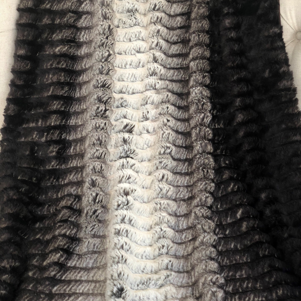a black and white fur blanket