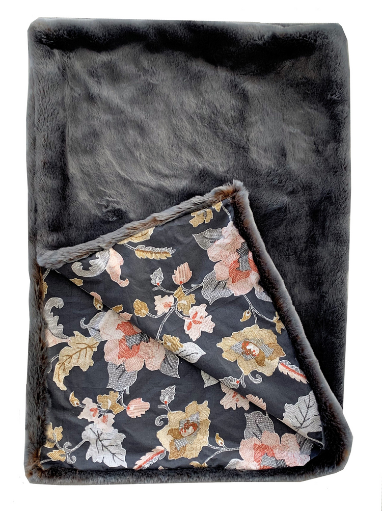 a blanket with a floral design