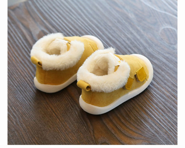 a pair of yellow shoes