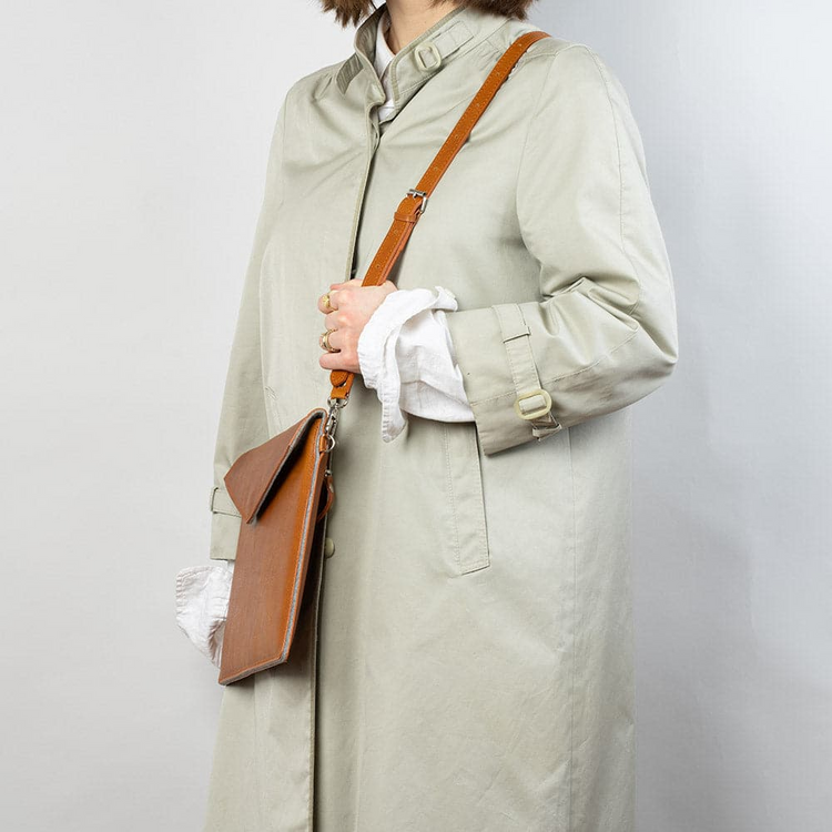 a woman in a trench coat