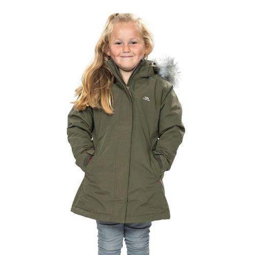 a girl in a green coat