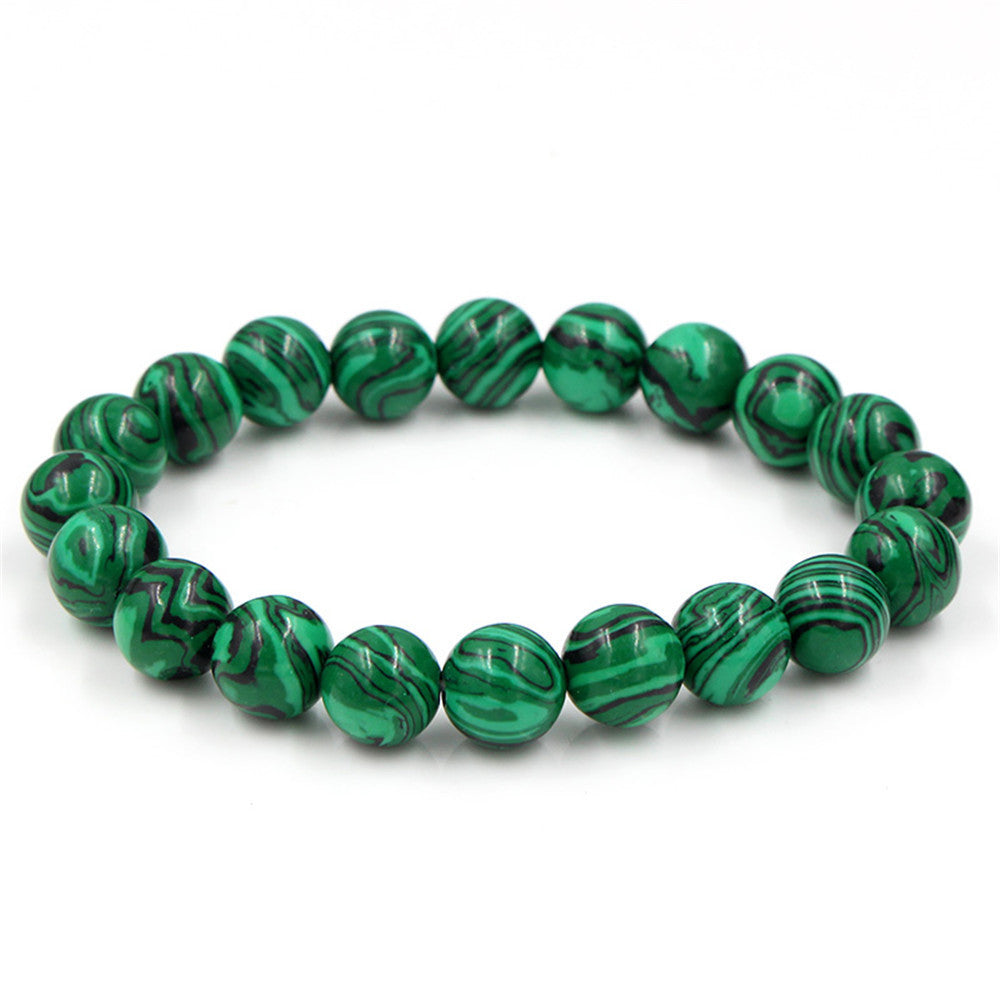 a green and black beaded bracelet
